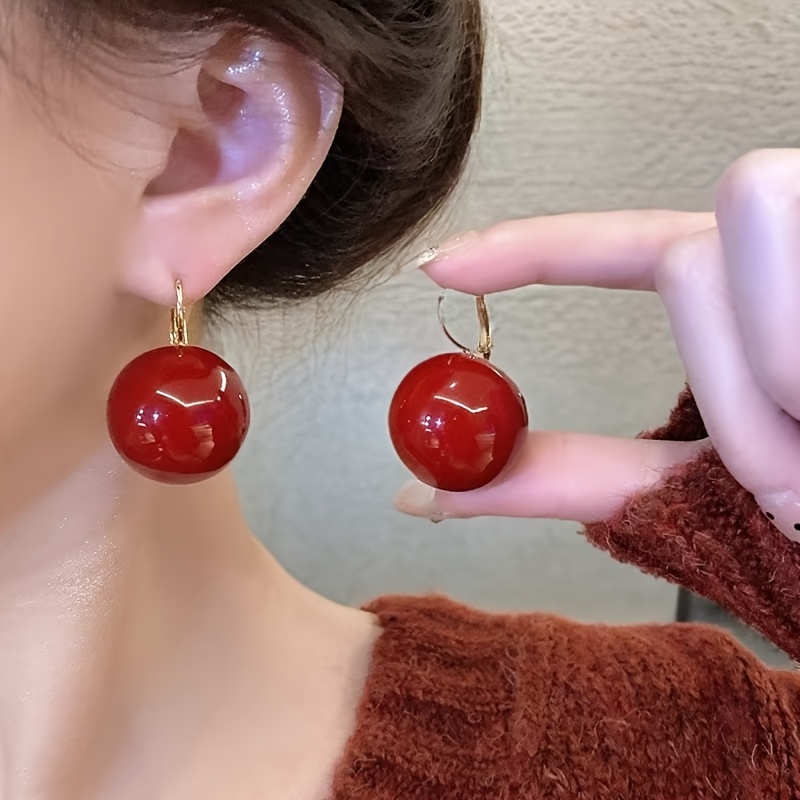 

Boucles d'oreilles vintage bohème en résine rouge, aiguille d'oreille en fer , accessoire polyvalent pour tous et les fêtes, adapté à toutes les , idéal pour de printemps