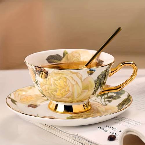 elegant floral gold plated coffee cup and saucer featuring a handcrafted made of bone china safe for the refrigerator and versatile