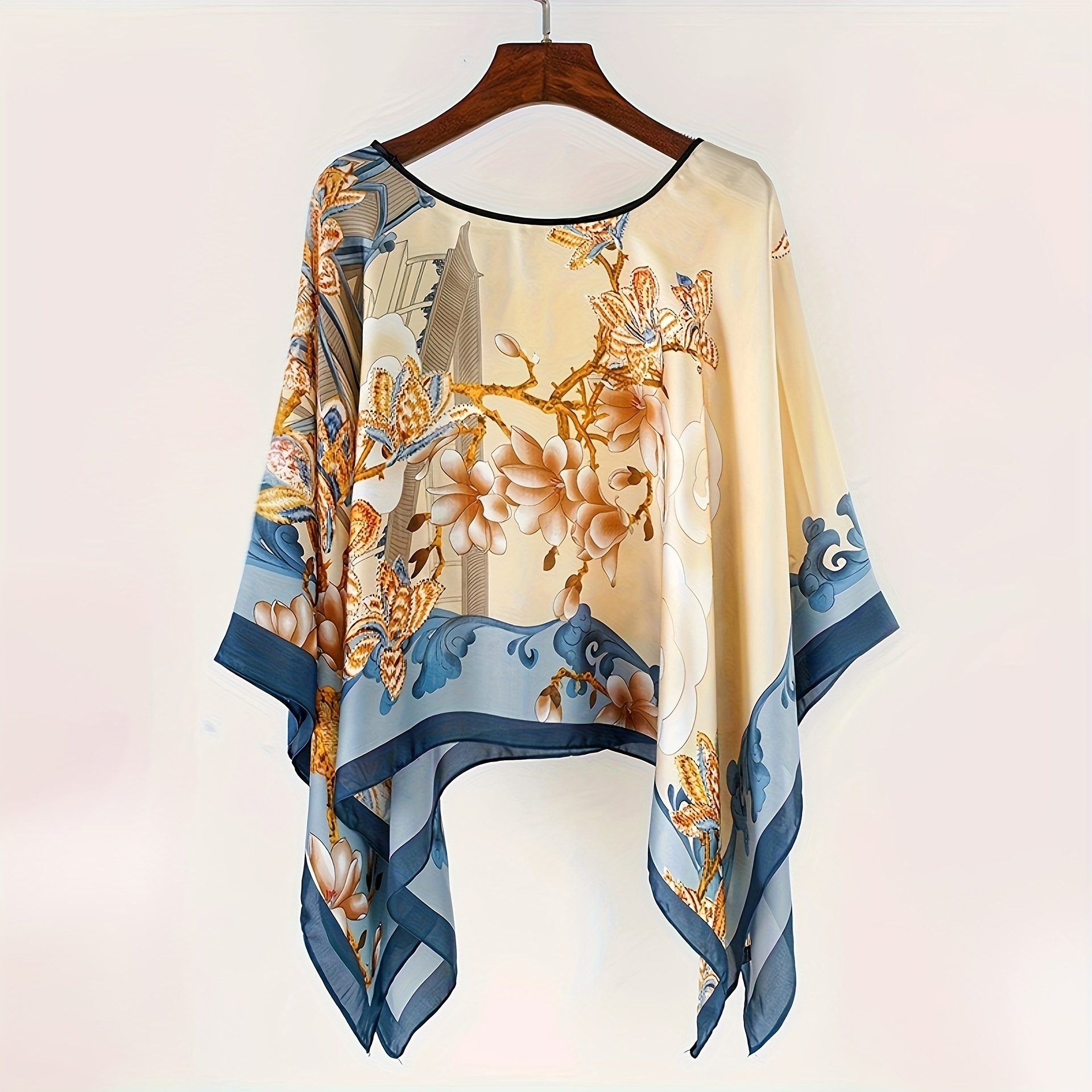 E-shop Dieses Schal zeigt ein auffälliges -Paisley-Muster. Die lockere Silhouette sorgt für , während der klassische Druck einen Hauch von Eleganz