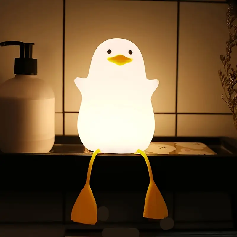 a yellow duck night light a fun yellow that flaps its wings a phone holder a rechargeable night lamp suitable for bedrooms and living rooms a quirky home decoration birthday and easter gifts Product details 1