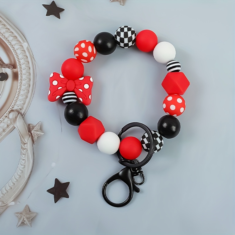 TEMU A Cute Polka Dot Bow Bead Wrist Keychain Sweet And Practical. The , Black, And Scheme Is , Featuring Elements Like Polka Dots And Checkered