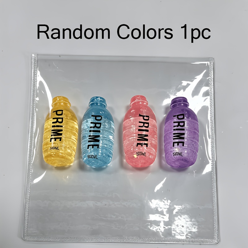 Image of Transparent Drink Bottle With Built-in Glitter. A Practical Souvenir And Gift Filler Perfect For Easter, Halloween And Christmas. Random Colors And Styles.