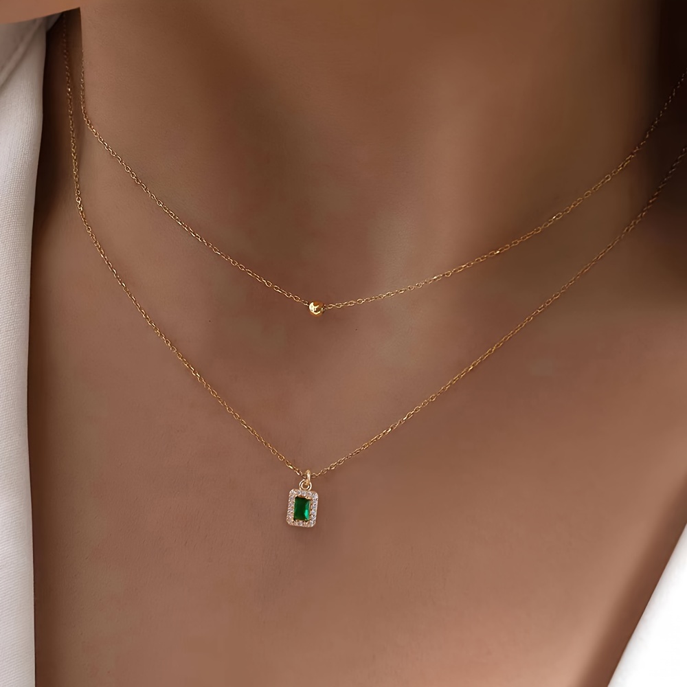 A Set of Two Stylish Classic Thanksgiving Necklaces Featuring Rectangular Pendants Inlaid with Zirconia Stones, Perfect for Layering, Along with Copper Bead Pendants, Making It an Ideal Gift for Women