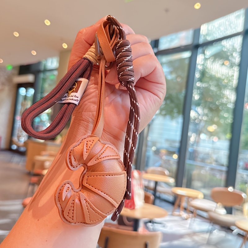 E-shop Geflochtener Seil-Anhänger für Tasche, hochwertiger Schlüsselanhänger, niedlicher Croissant-Ins-Taschenanhänger, modischer Hänge-Anhänger