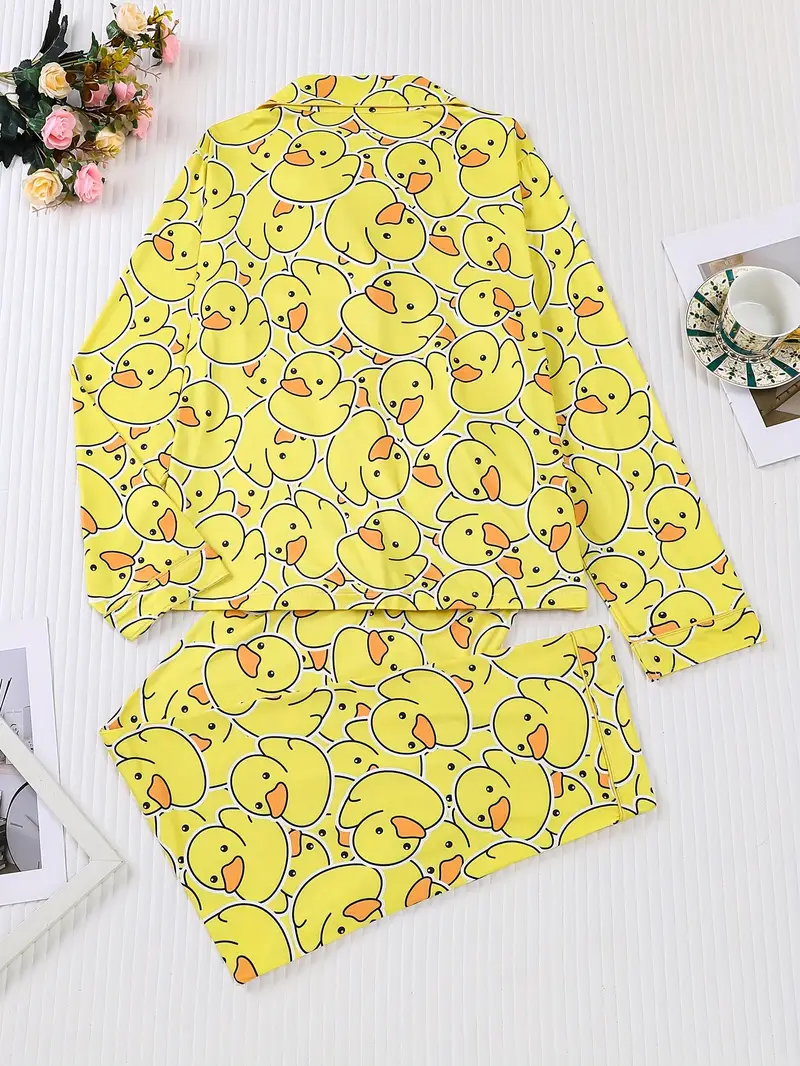 two piece womens yellow duck print pajamas set fabric comfortable all year round long sleeved button up top collar and matching pants with full body print and pocket details suitable for adult pajamas set Product details 1