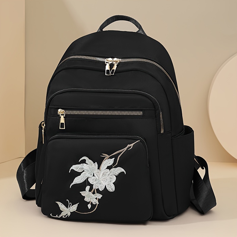 

Elegant Women's Embroidered Floral Backpack - Spacious Multi-compartment, Lightweight With Adjustable Straps, Zip Closure