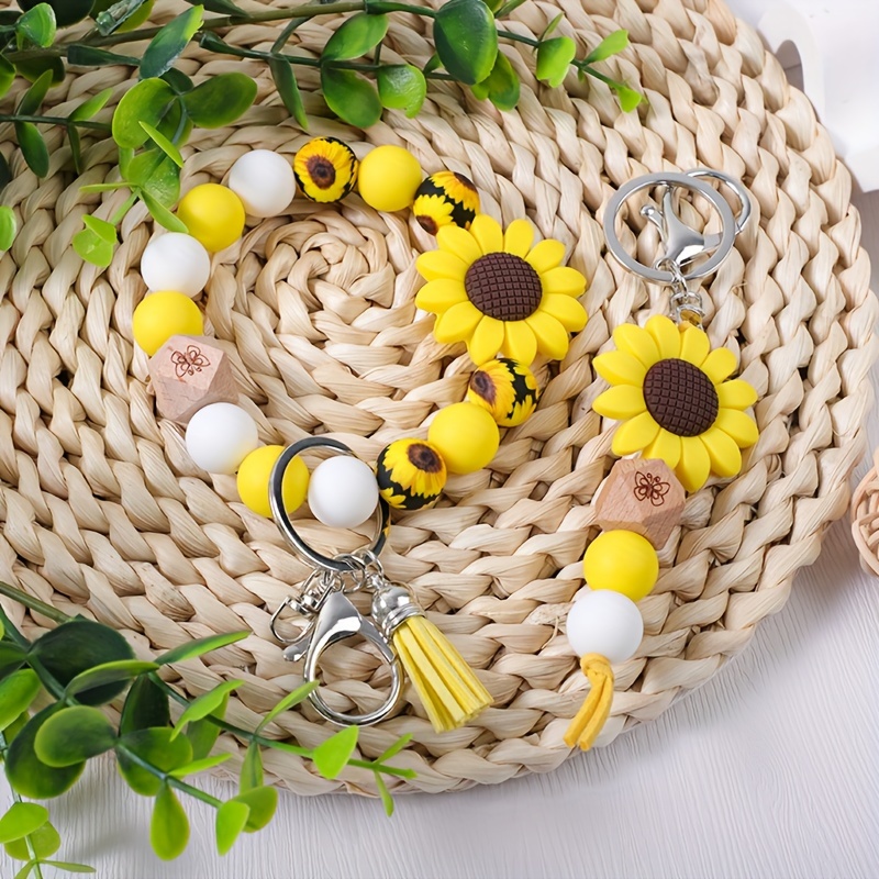 

2~4pcs/set Sweet And Cute Cartoon Sun Flower Charm Silicone Bead Bracelet Charm Keychain Short Tassel Keychain Accessories Bag Pendant Accessories Gift