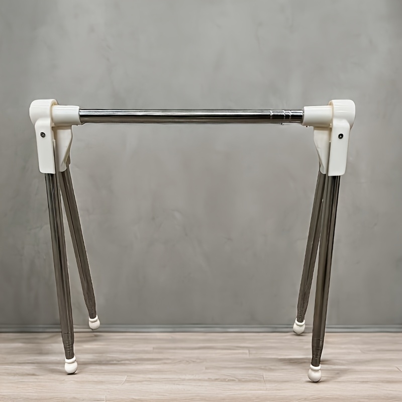 A Portable Telescopic Clothes Rack, Travel Hanger Is Easy To Carry, Folding Stainless Steel Telescopic Hanger, Random