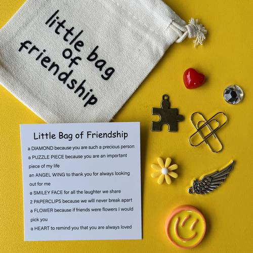 precious friendship gift tiny friendship hug pack with inspirational cards accessories including hearts flowers wings puzzles faces diamonds paper clips birthdays weddings graduations ideal long distance keepsake