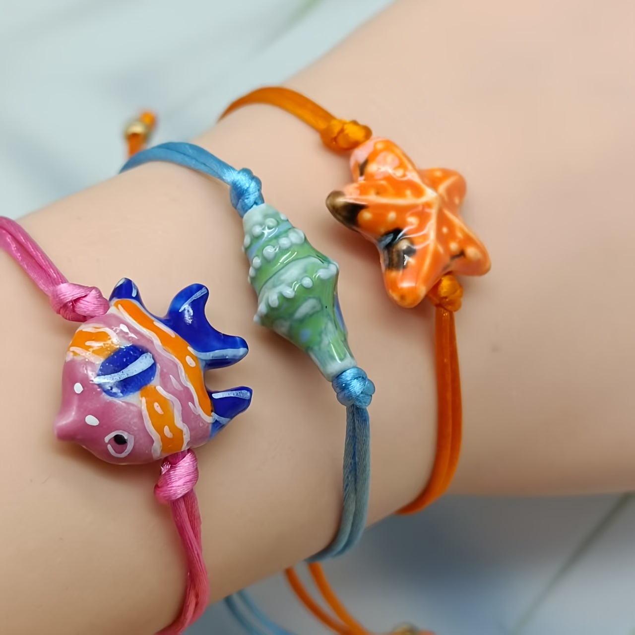 Colorful Ceramic Starfish Charm Bracelet with Orange and Pink Beads