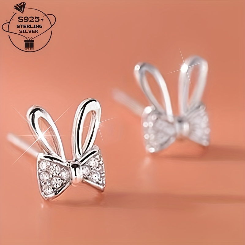 

A Pair Of 925 Earrings With A Bow, Suitable For Wear And Parties, All .