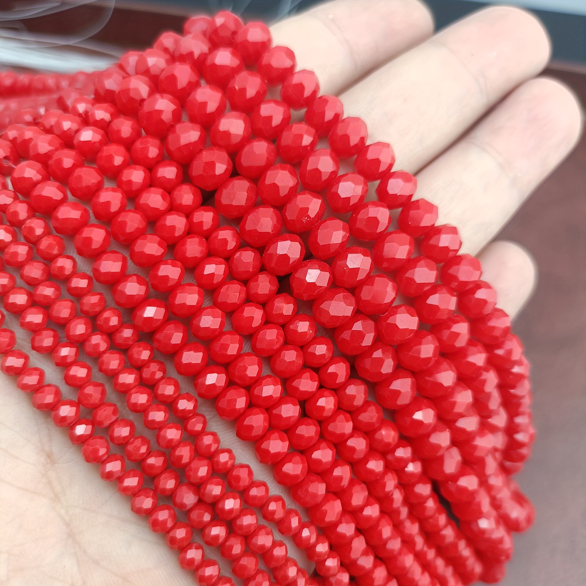 Bracelet élastique petites perles de verre rouges