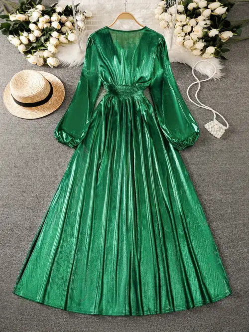 royal green silk dress Our Serenia dress in royal green satin is designed to capture the light and turn heads. Full-length white ruched detailing adds a striking visual charm, while a delicate white buckle subtly defines