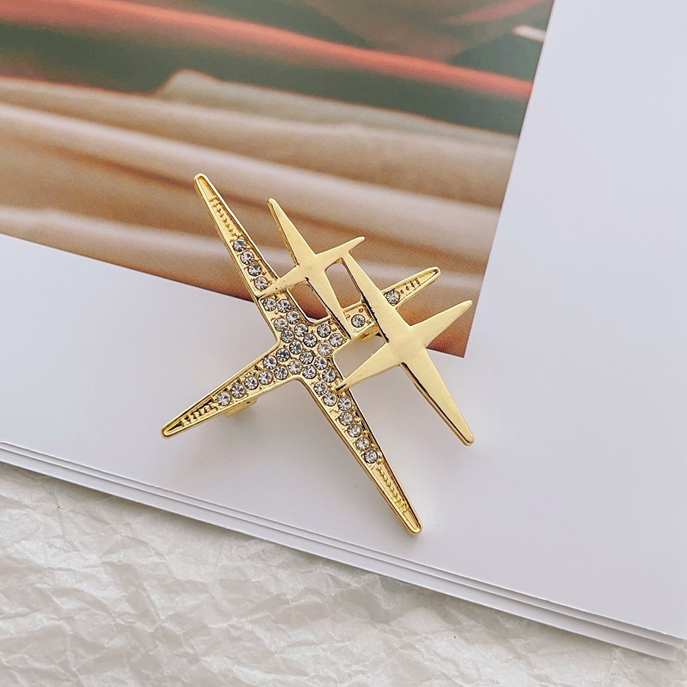 Elegant Cross-shaped Star Pin For Men And Women, Featuring A Stylish Rhinestone Design In Golden
