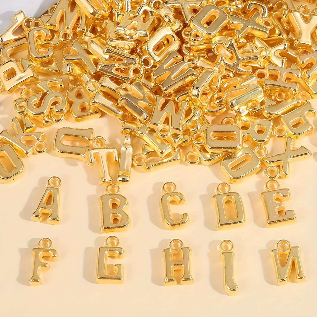 letter charms jewelry sold on Temu United States