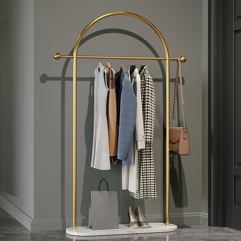 freestanding metal clothing rack marble base portable golden