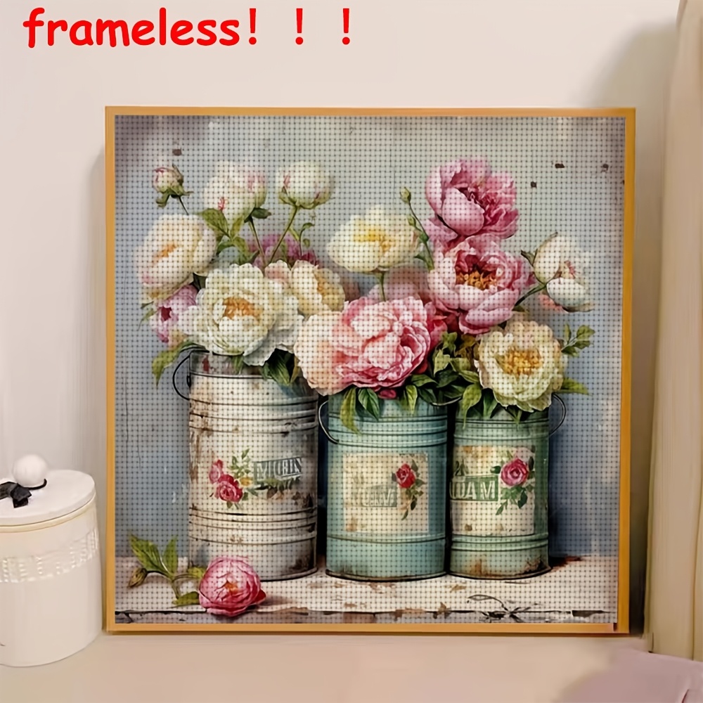TEMU Un kit de point de croix avec un design cadre, boîtes et des sur une table. Cette œuvre d'art à est pour les adultes et les débutants, ce qui un