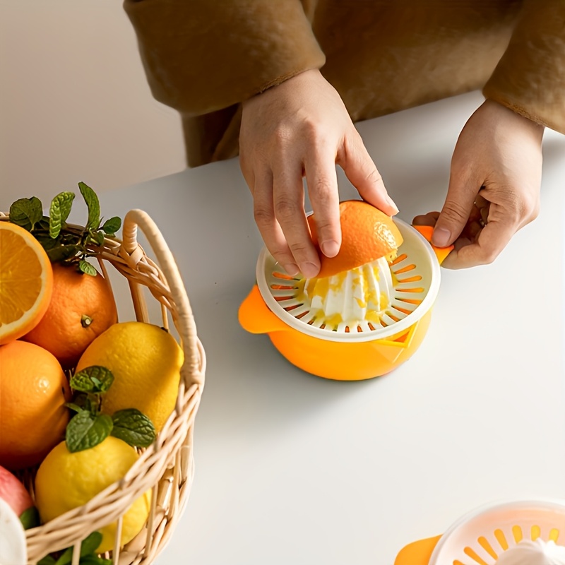 

Compact Manual Citrus Juicer - Easy-to-use, Washable For & Ice, Home Kitchens - Orange/white