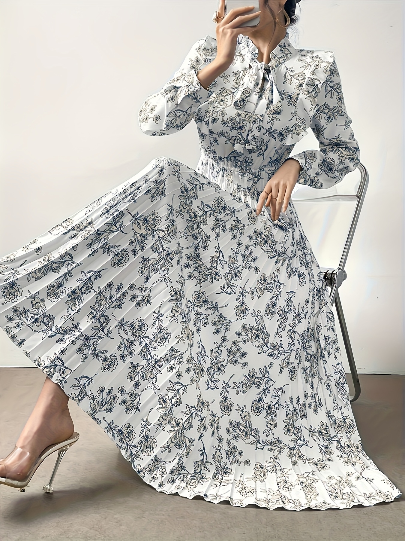 Floral Print Ruffle Neck Pleated Maxi Dress in soft polyester blend