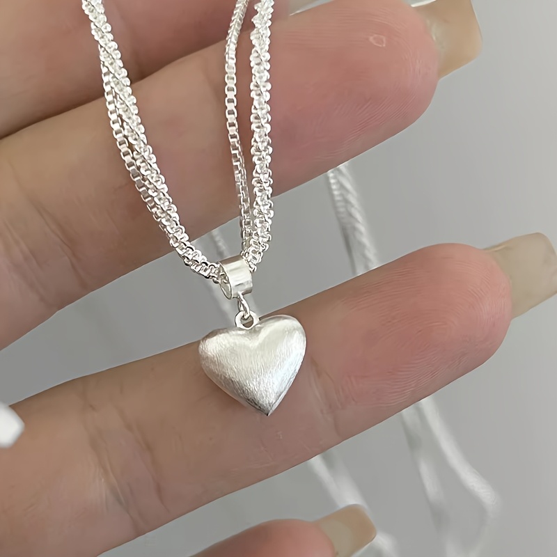 TEMU 1 pièce Collier pour femme de luxe léger à double couche avec pendentif cœur brossé - , convient pour mariage, usage , chaîne de pull rétro Y2K,
