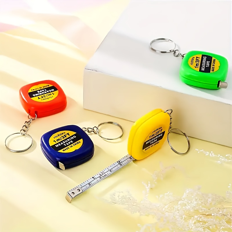 

10- Pu Retractable , Metal Keychain Roll-up Rulers In Centimeters