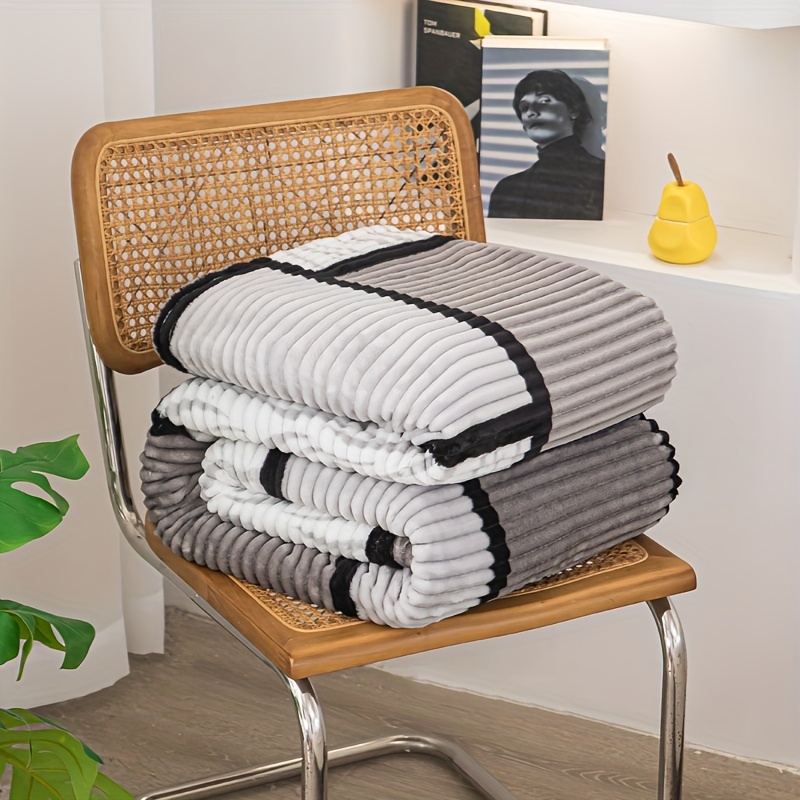 a magical fluffy striped blanket with printed   made of fleece   the office or a nap details 10