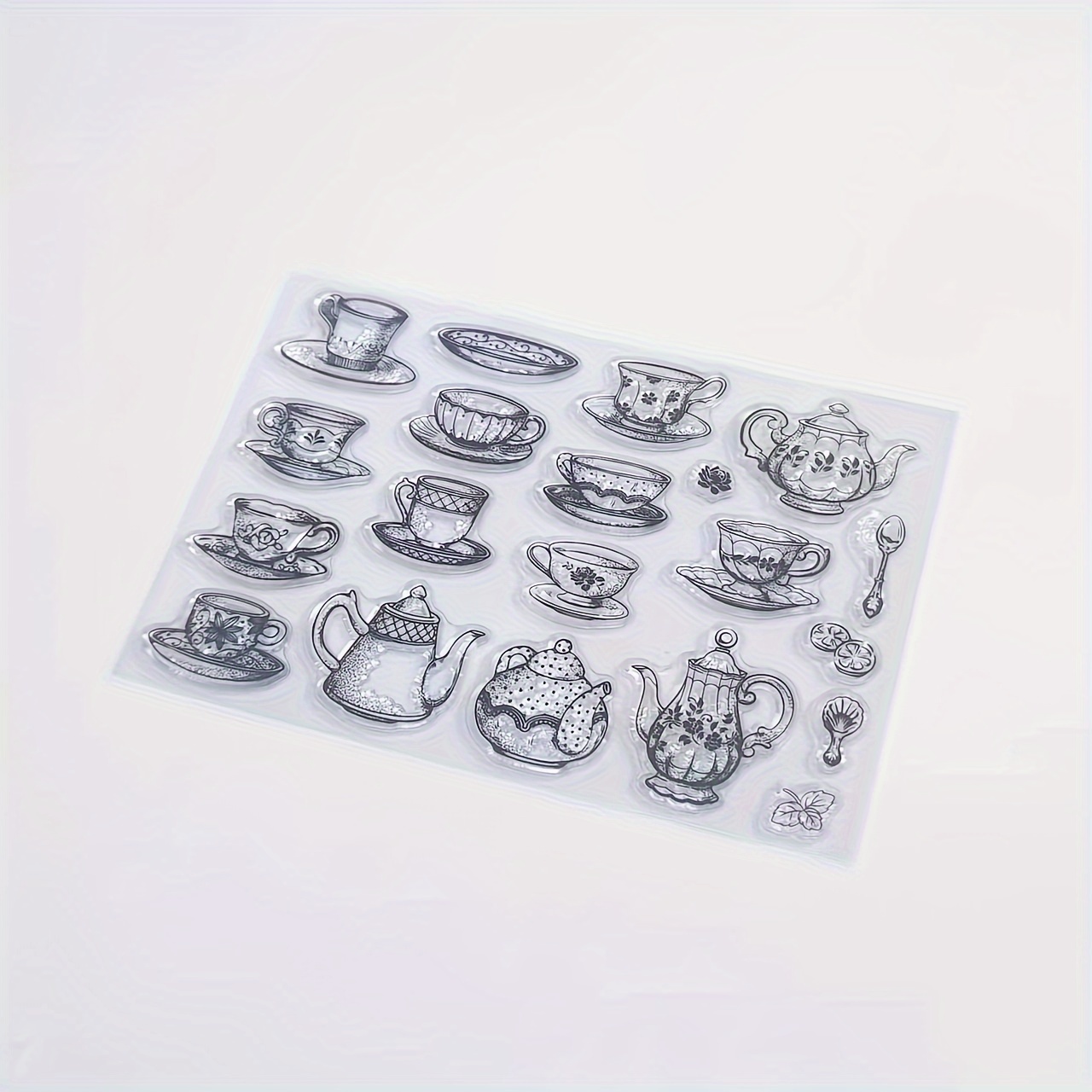 Image of A Wide Of Teapots, Teacups, Mugs, Spoons, And Transparent Stamp Seals With Messages For Making, Decoration, Diy Albums, And Diy Crafts