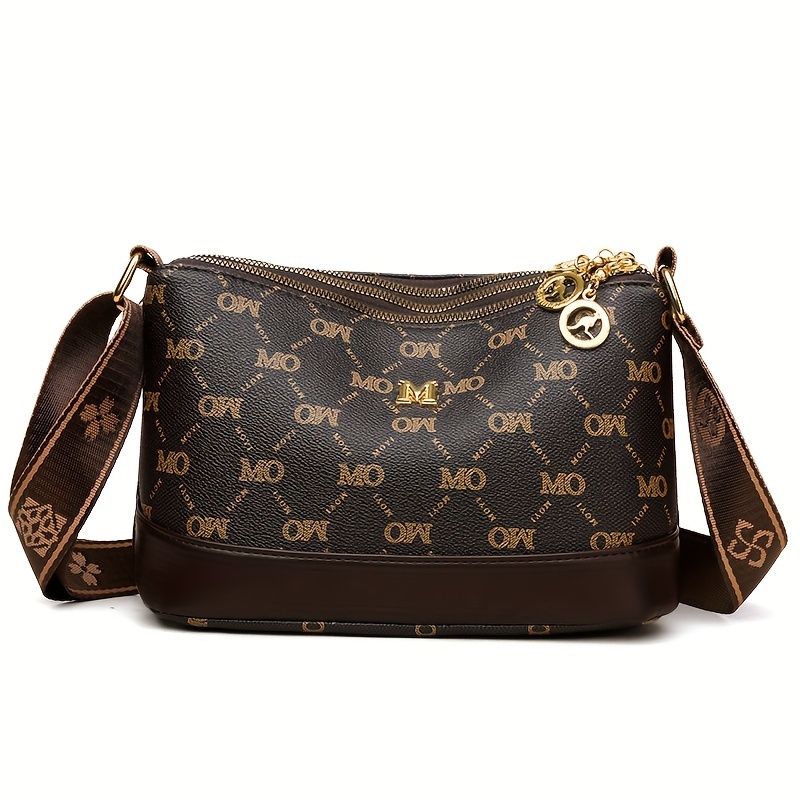 Image of A Vintage Printed Women's Shoulder Bag With Wide Straps, Featuring Multiple Compartments For Practical Storage. This Crossbody Bag Is Perfect For , Casual Vacations, Shopping