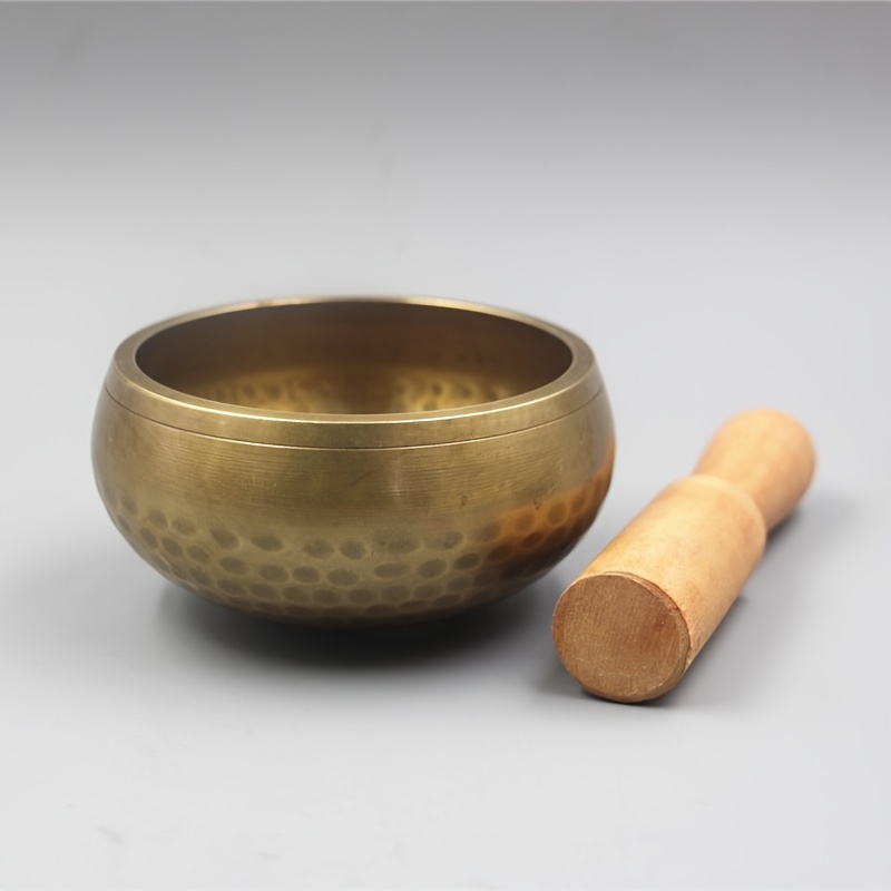 

Handmade Singing Bowls Made Of Golden, Copper, And Brass For Meditation And Yoga