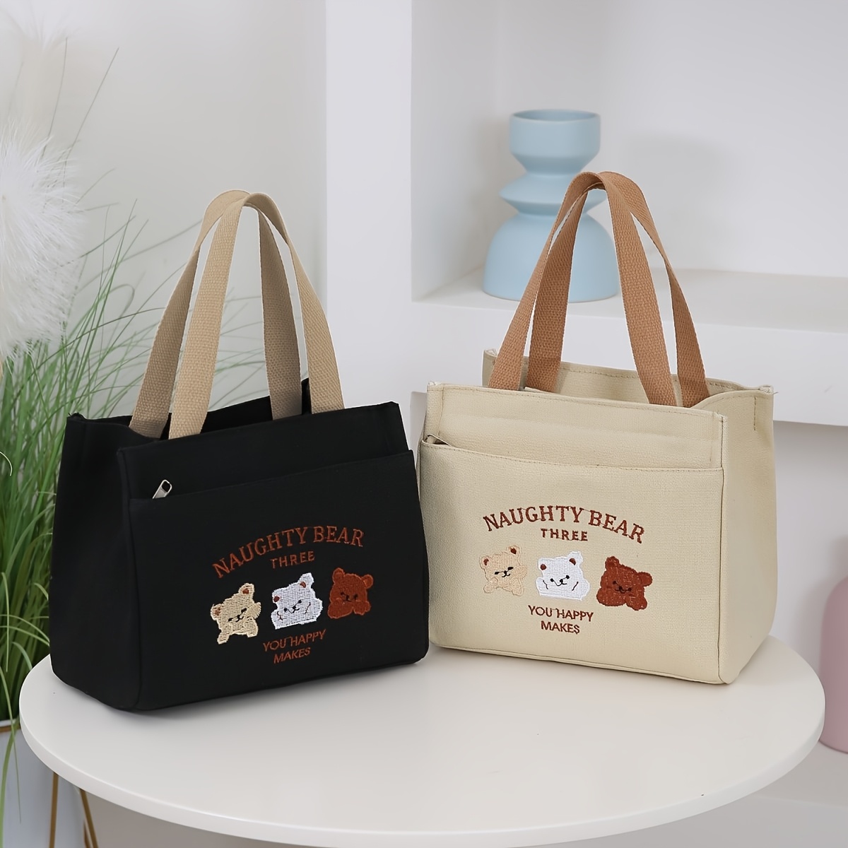 

A Cute Canvas Tote Bag With A Zipper, Spacious And Simple For Easy Carrying, Lunch Boxes And Suitable For Picnics And Shopping.