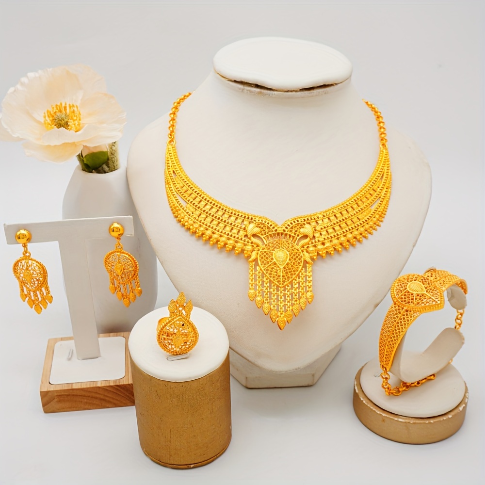 traditional bridal jewelry set 1 pair hollow tassel dangle earrings 1pc pendant hollow necklace 1pc waterdrop ring and 1pc bangle bracelet set copper clothing and wedding accessories details 1