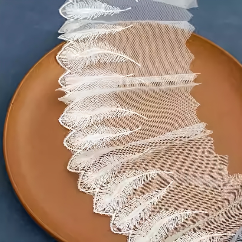 A 36-inch Long Lace Embroidered In Of A Feather, Perfect For Embellishing Curtains, Bridal Gowns, And Theatrical Costumes, For Projects