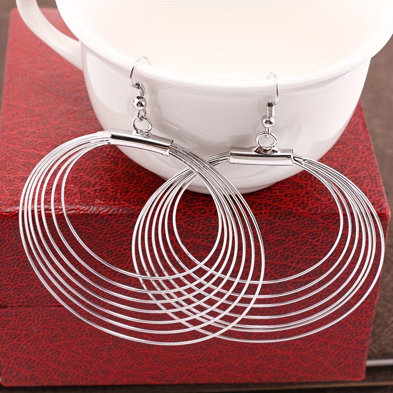 Multi-layered Large Hoop Earrings With A Dynamic Layered Effect And Sparkling , Suitable For Clothing Styles To Enhance Overall Fashion Sense