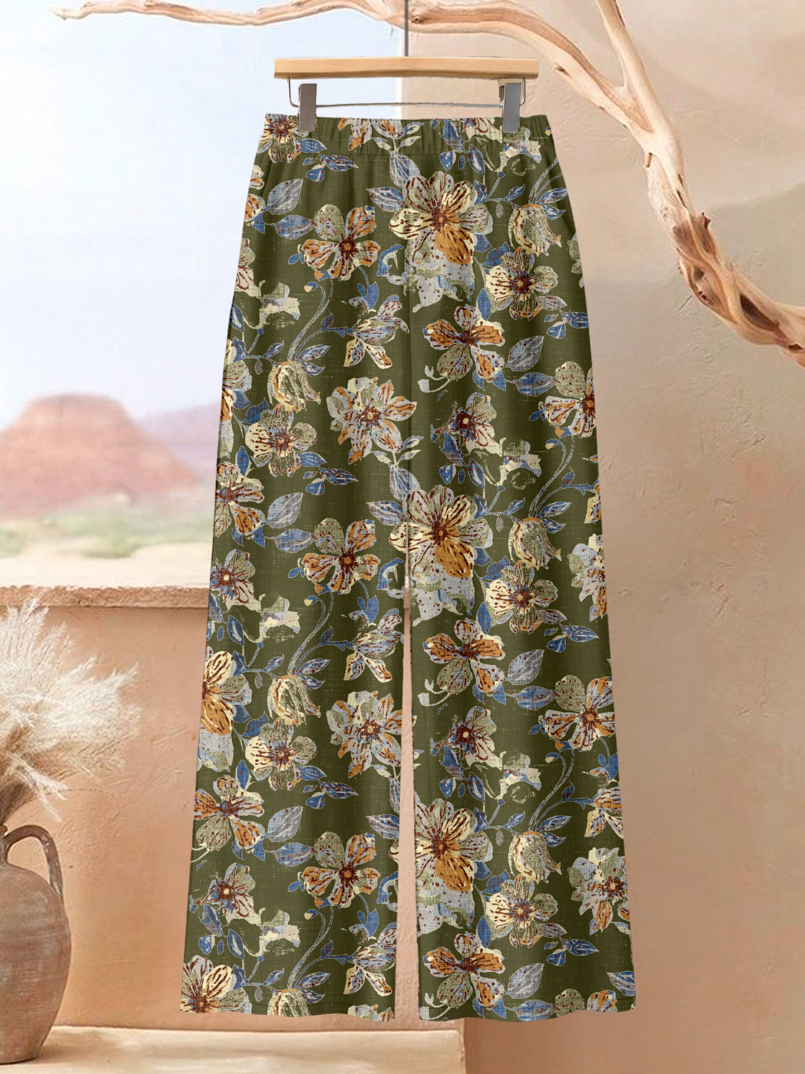 Ensemble Floral Grande Taille Femme — Haut Uni & Pantalon Fleuri Ensemble 2 pièces grande taille : haut uni à ourlet irrégulier et pantalon à imprimé floral, élégance au quotidien