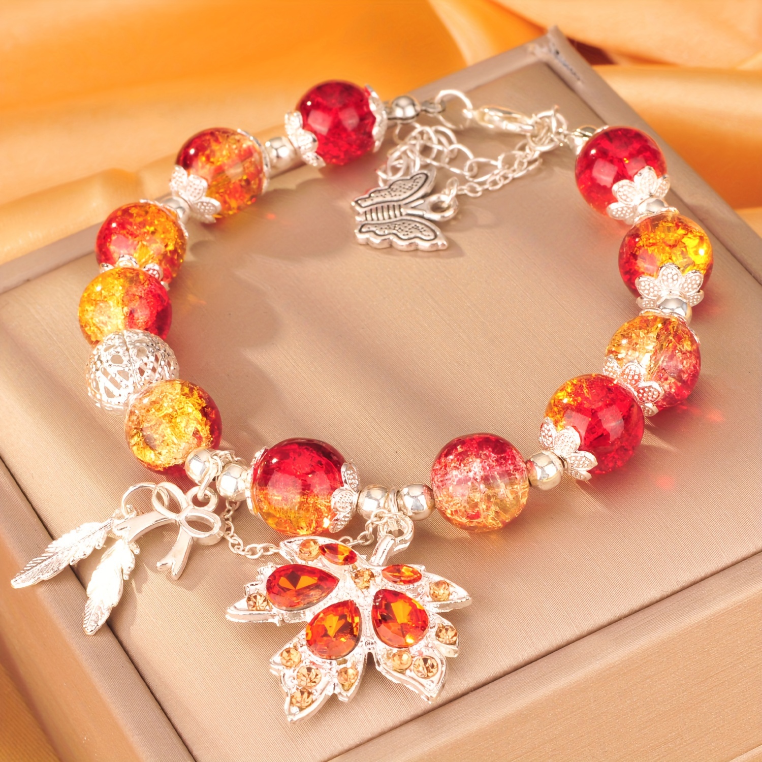 

Maple Leaf Charm Bracelet With Red & Yellow Gradient Glass Beads, Women's Elegant Beaded Jewelry Accessory, No Power Required
