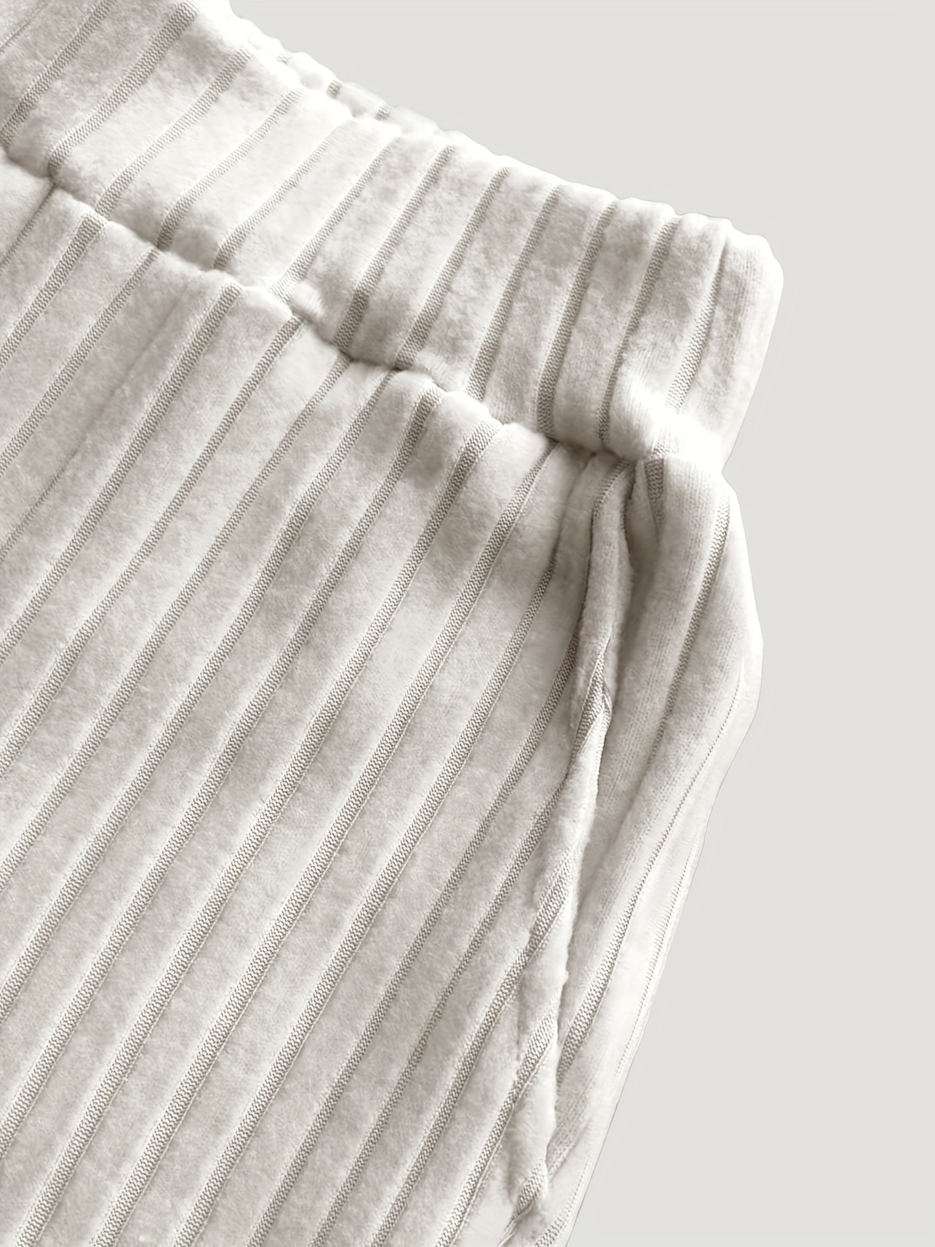 Model walking outdoors, lifestyle shot, image 10