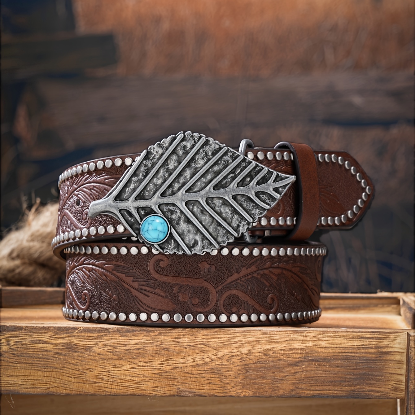 a unisex casual western style belt featuring embossed leaf  display picture 1