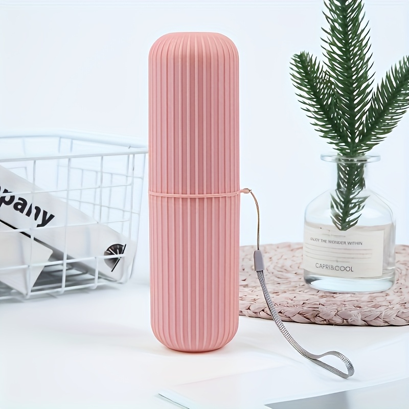 Travel toothbrush with portable storage case, rinsing cup, and toothpaste holder - a compact design, the perfect gift for oral care on the go