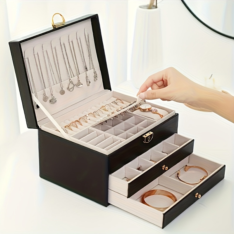 3 tier jewelry box organizer with key lock elegant green   lined compartments secure locking lid for earrings rings necklaces bracelets perfect gift for women home   decor durable synthetic   leather construction large jewelry box keepsake holder sophisticated design   leather   jewelry boxes Product details 7