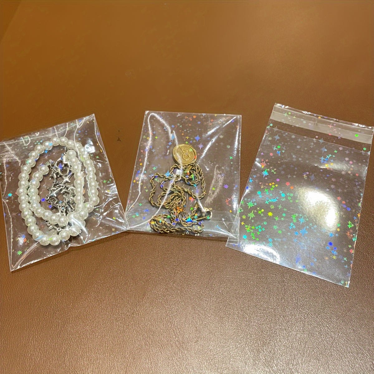 50 Transparent Laser Jewelry Pouches, Glitter Storage Bags