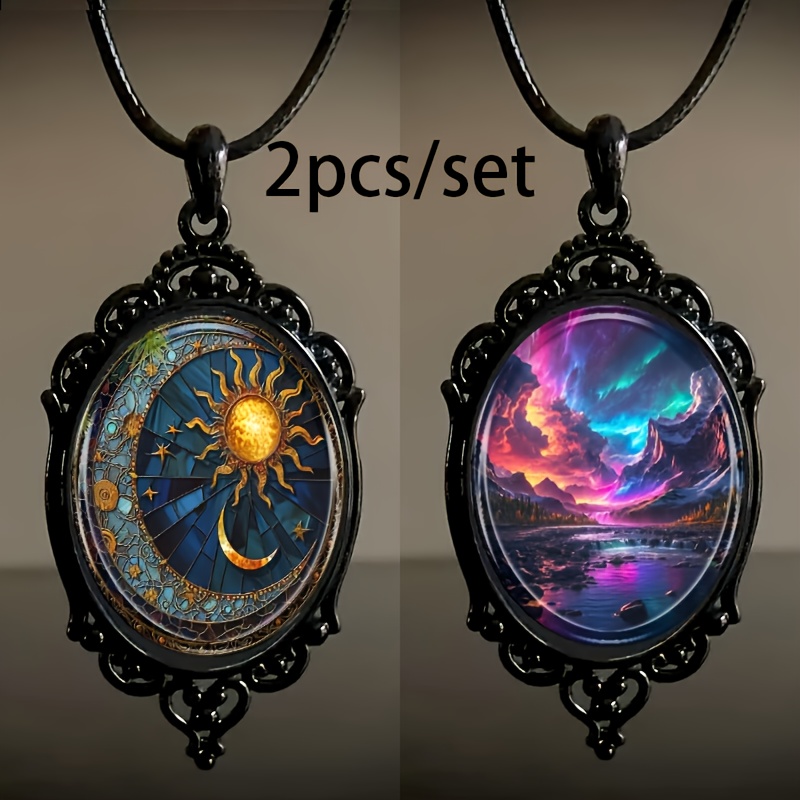 

2pcs/set Fashion Elegant Sun And Moon And Aurora Landscape Pattern Black Frame Glass Necklace Romantic Gift Jewelry