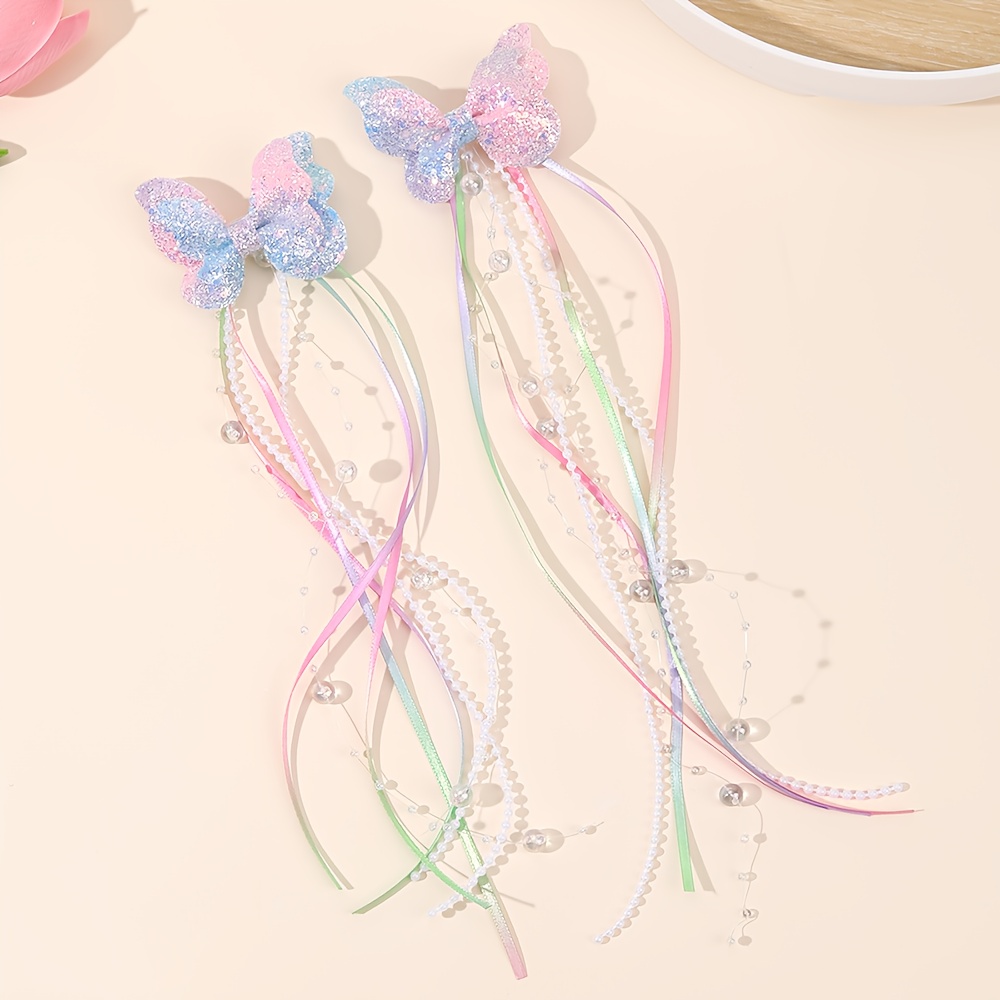 Image of 2pcs Sweet Glitter Bow Hair Clips For Party Styling Bow Hairpins With Long Tails Cute Hair Accessories For Daily Wear