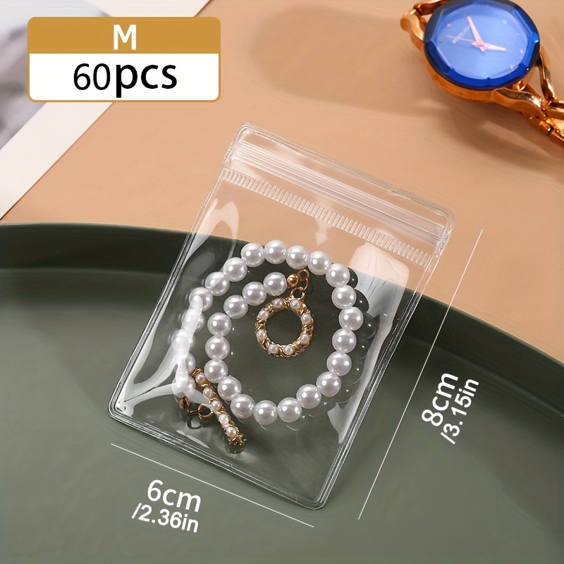 E-shop 60 Stück transparente Schmuck-Reißverschlussbeutel – rostfreie, selbstversiegelnde, wasserdichte Plastiktaschen, geeignet für Ringe, Ohrringe,