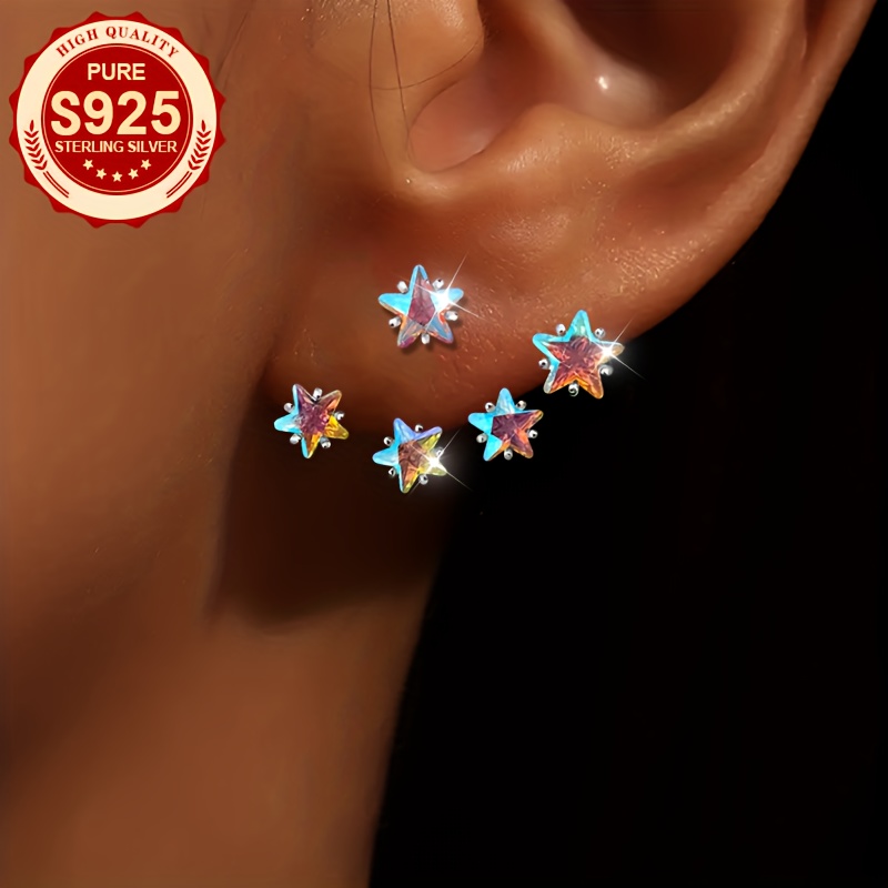 

A Pair Of S925 Silver Earrings For Women Featuring Ear , Festivals, Gifting, Parties, And Wear. Are Hypoallergenic And Come With Silver Ear Plugs, Weighing 3g.