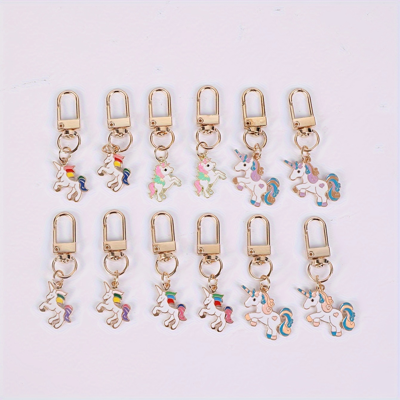 Image of A Set Of 12 Alloy Oil- Cartoon Unicorn Keychains, Perfect For Party Gifts And Holiday Items