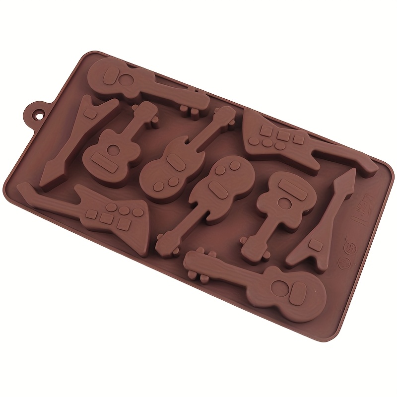 Image of Three-dimensional Ten-in-one Musical Instrument Baking Mold For Diy Mousse Cakes, Chocolate Puddings, Handmade Soaps, And Aromatherapy. Heat-, -, And Easy To Demold