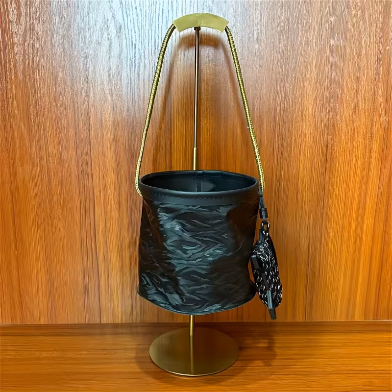 one piece of a collapsible bucket with a 3 a portable plastic container suitable for activities like camping and fishing ideal for live bait and folded for use bathroom or patio Product details 5