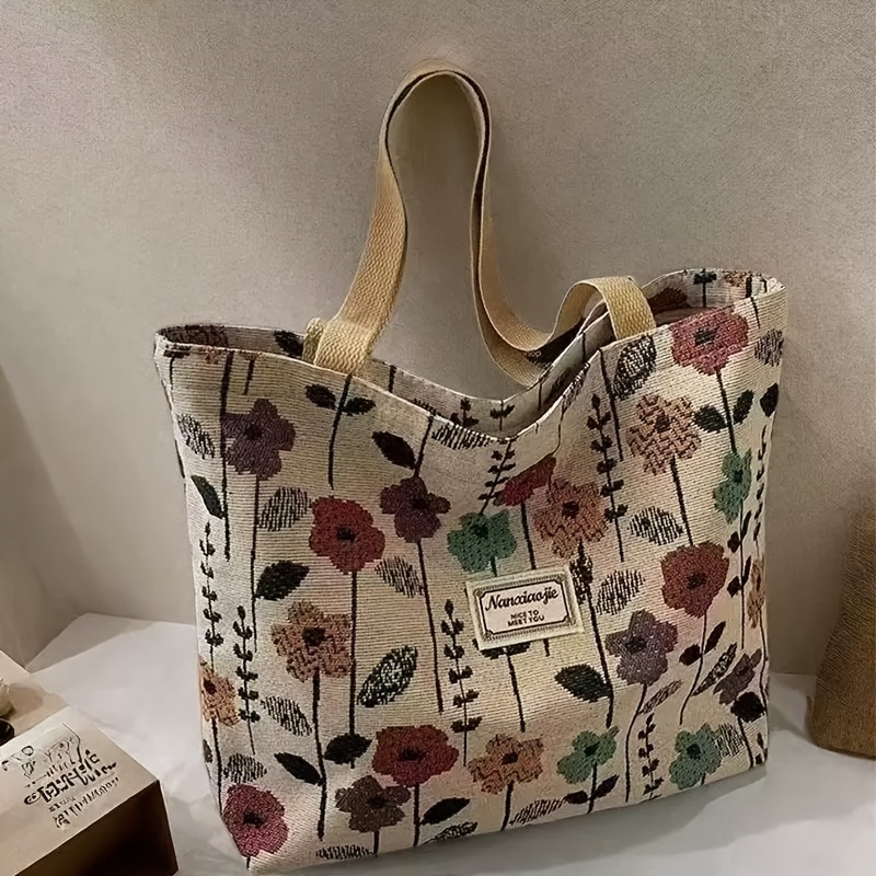 a popular tote bag with a floral print 2026 new minimalist   large capacity for commuting college style shoulder bag trendy and versatile for students
