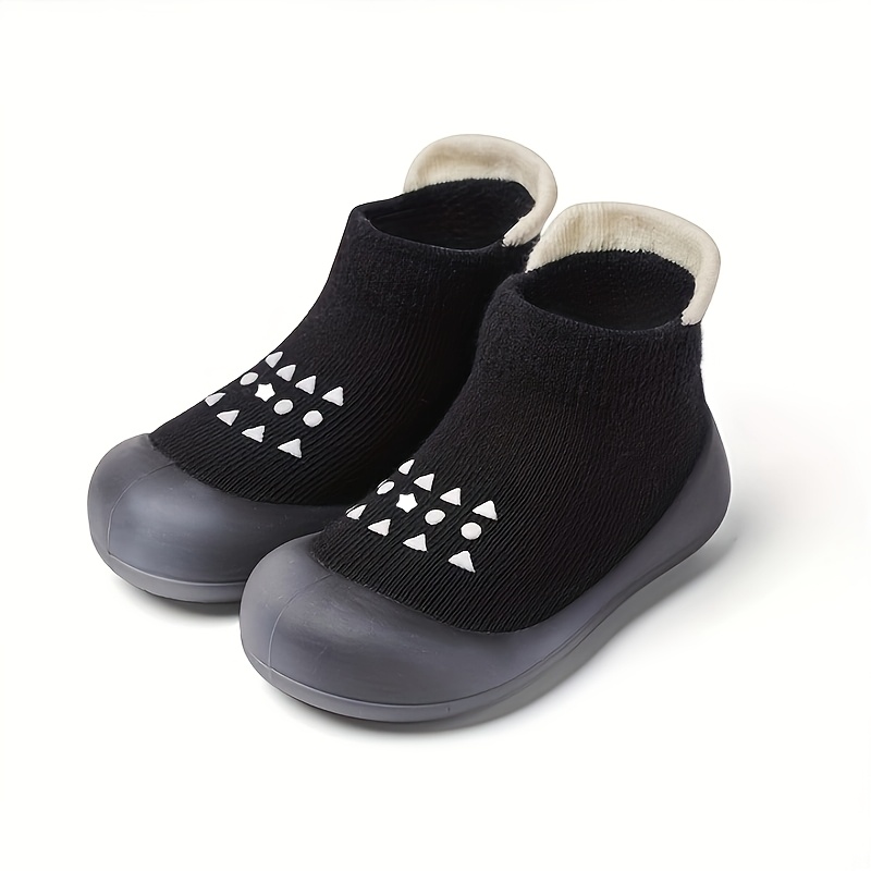 A set of walking socks designed for boys and girls, featuring non-slip breathable slippers with a soft sole