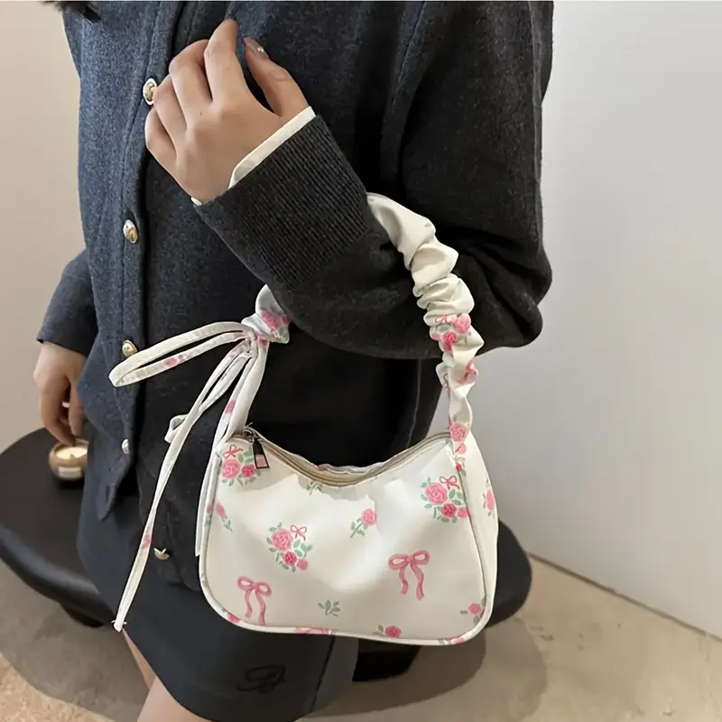 floral print mini shoulder bag for women lightweight polyester crossbody bag with adjustable bow strap zipper closure white black compact travel pouch cute accessory smooth texture small purse details 5